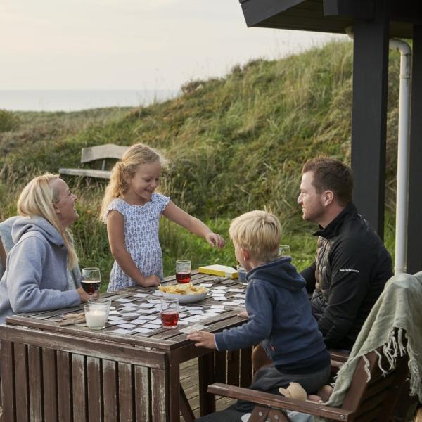 Family cosiness in a holiday home with a view