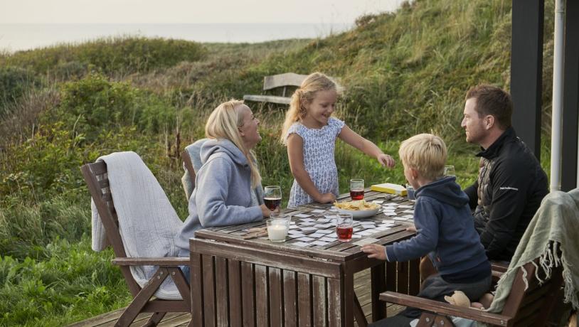 Family cosiness in a holiday home with a view