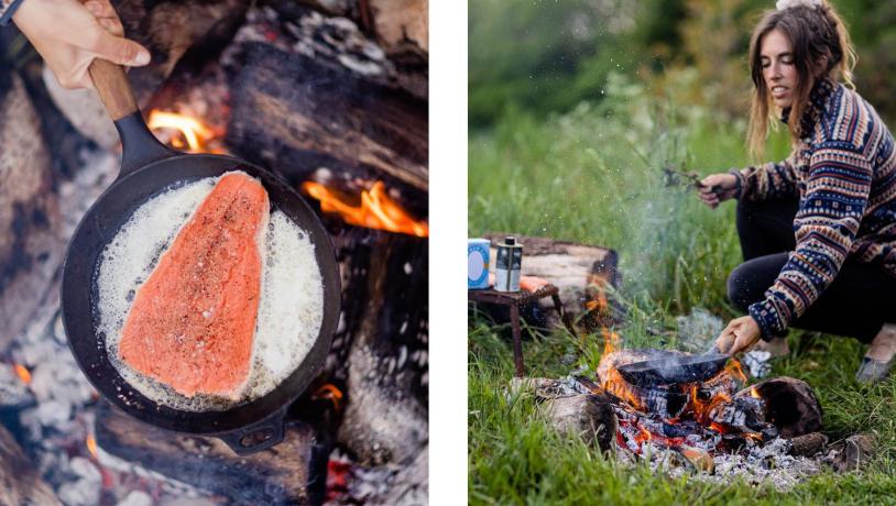 Kvinde laver fisk over bål