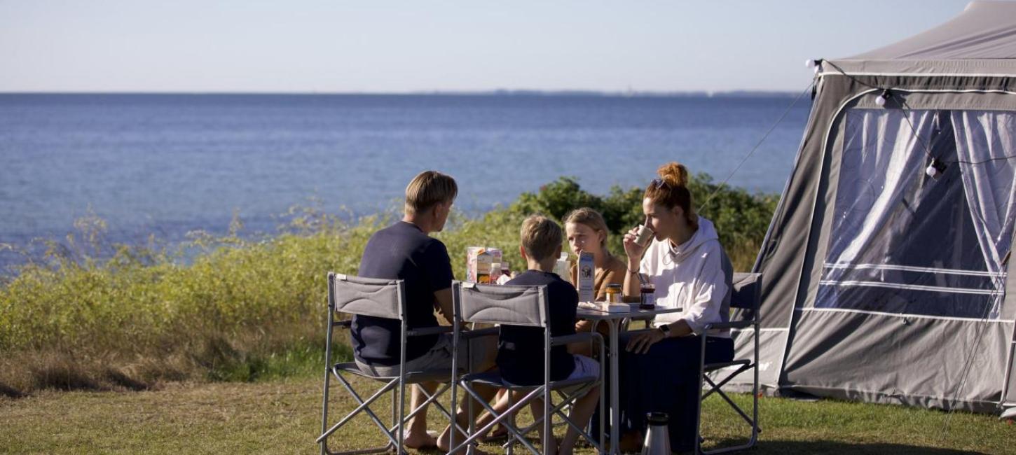 Camping by the water, family