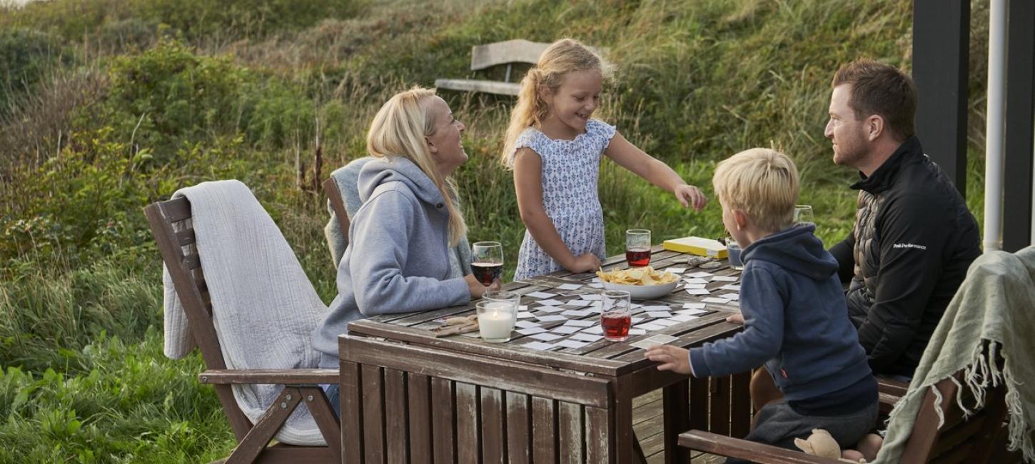 Family cosiness in a holiday home with a view