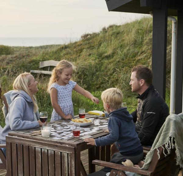 Family cosiness in a holiday home with a view