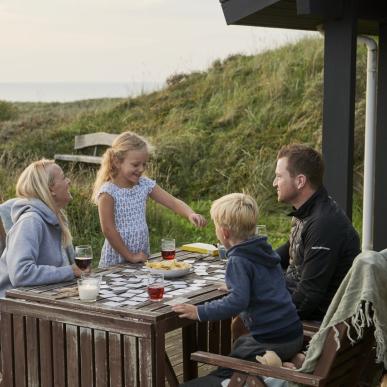 Family cosiness in a holiday home with a view