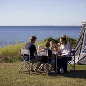  Camping by the water, family